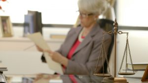 Lady reading legal documents
